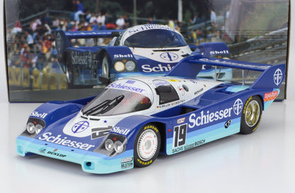 Detailed Schiesser Porsche race car model with blue and white livery, shown with racing backdrop, offered on Vroomi