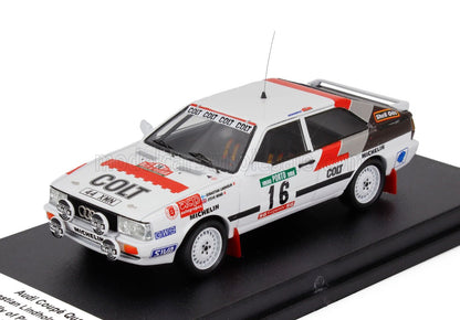 Coche de rally Audi Coupé Quattro número 16 con logotipos de COLT y Michelin, disponible en Vroomi.