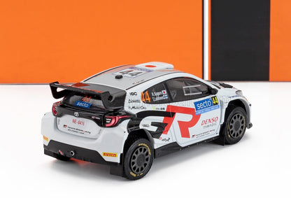 White Toyota GR Yaris rally car model with red and black decals, number 44, available on Vroomi