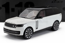 White and black 1:18 scale Range Rover SUV model with detailed wheels and interior, available at Vroomi