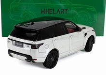 Maqueta de coche Range Rover en escala 1/18, de color blanco con techo negro, disponible en Vroomi.