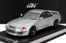Silver Nissan Skyline GT-R R32 scale model car with Nismo details, offered on Vroomi platform