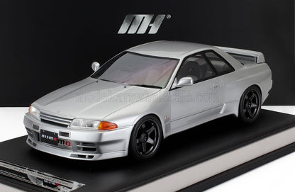 Silver Nissan Skyline GT-R R32 scale model car with Nismo details, offered on Vroomi platform