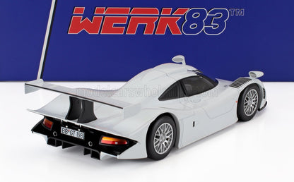 1/18 scale white race car model with rear wing, available for collectors on Vroomi.