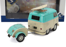 Autobús VW a escala 1:18 fabricado en metal fundido con remolque y tabla de surf, actualmente disponible en línea.