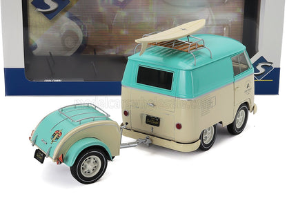 Autobús VW a escala 1:18 fabricado en metal fundido con remolque y tabla de surf, actualmente disponible en línea.