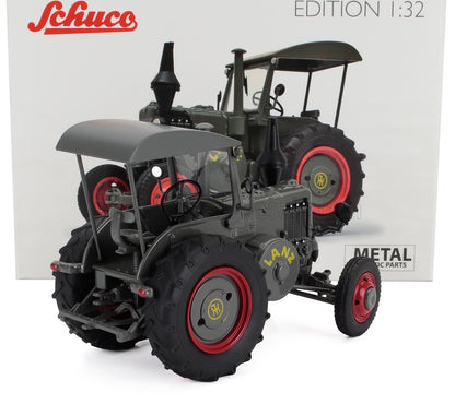 Edición Schuco a escala 1:32, modelo vintage de tractor Lanz gris y rojo con piezas metálicas, disponible en Vroomi.