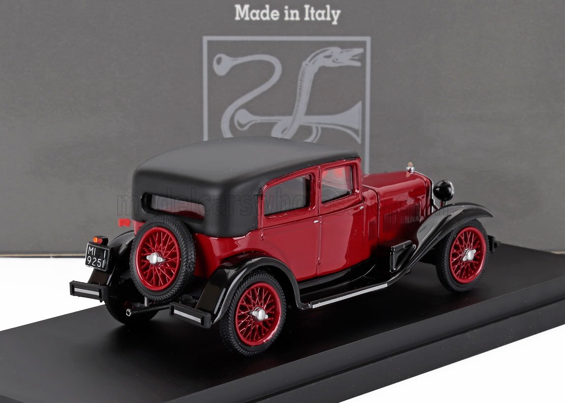 Coche de colección vintage rojo y negro con ruedas de repuesto traseras, disponible para su compra online.