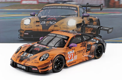 Orange Porsche 911 GT3 race car model with black palm tree decals, number 91, Goodyear tires, featured on Vroomi