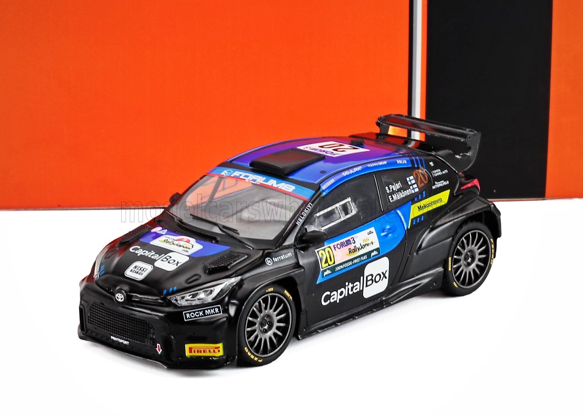 Black and blue rally car model with CapitalBox and Pirelli logos, available on Vroomi