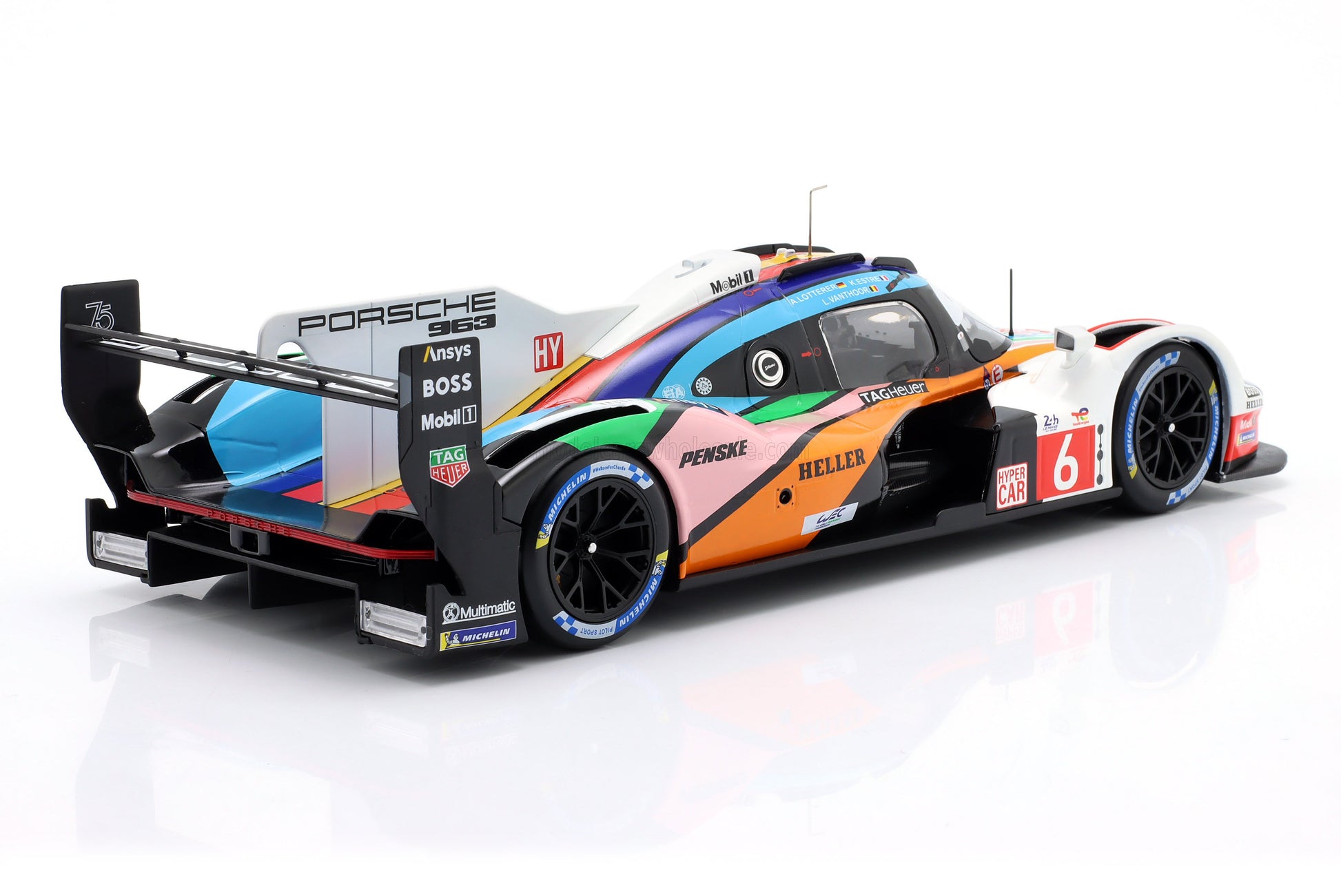 Porsche 963 race car model in multicolor livery with racing decals, available on Vroomi