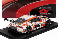 Modelo de coche de carreras Toyota GR Supra a escala 1/43 fabricado en metal fundido con los colores de AU y ZENT, Super GT 2025, disponible en Vroomi.