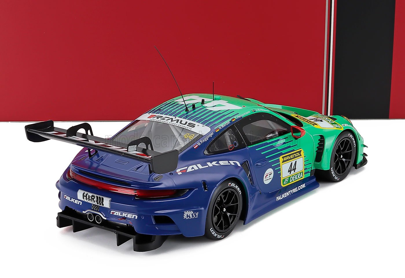 1/18 scale Porsche race car model with Falken livery, available now for collectors.