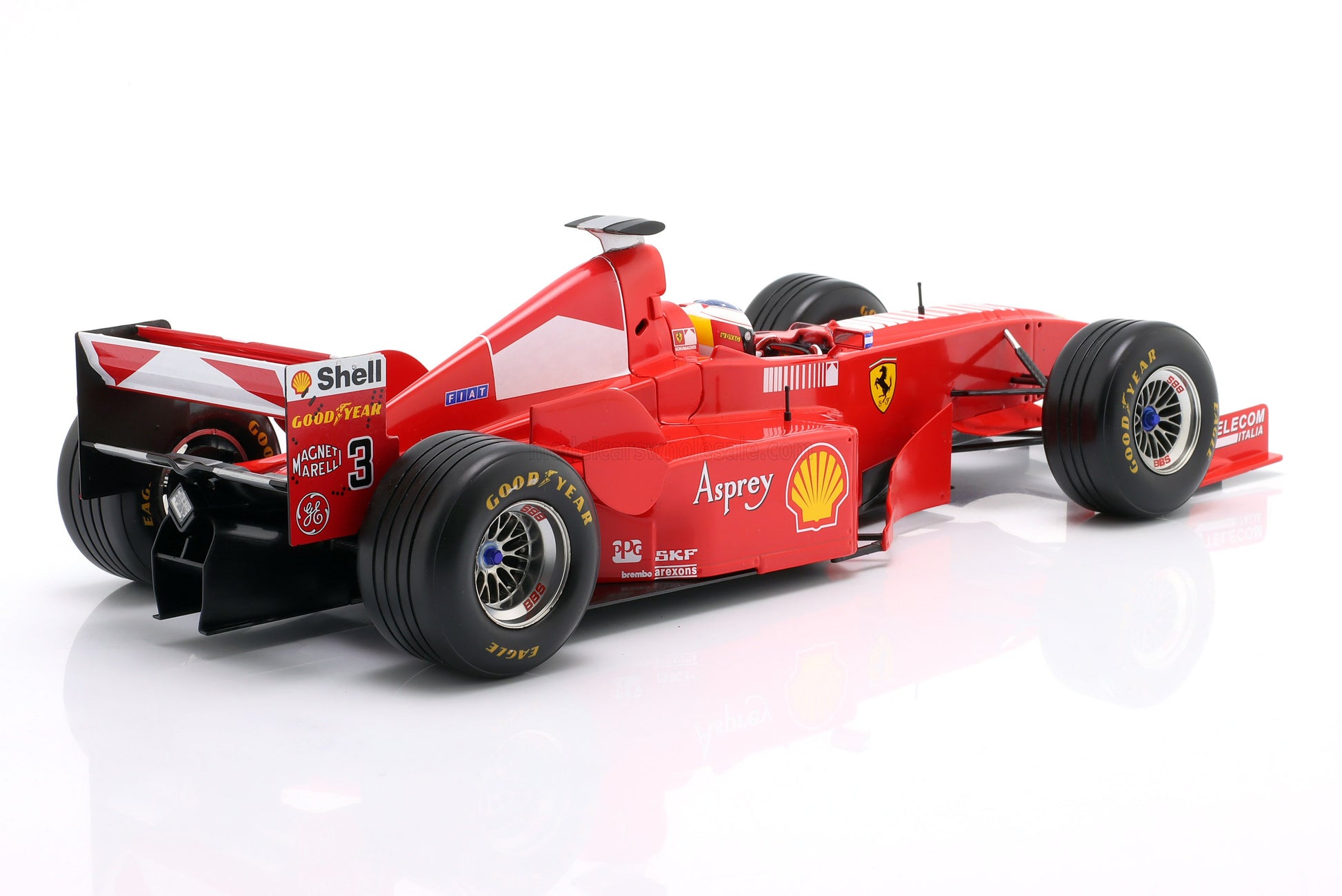 Maqueta de coche Ferrari F1 rojo con logotipos de patrocinadores, disponible para coleccionistas en Vroomi.
