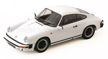 White Porsche 911 scale model car, detailed replica in 1/18 size, available for collectors now.