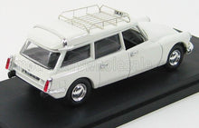 Modelo Citroën DS vintage blanco con señal de taxi y portaequipajes en el techo, presentado en la plataforma Vroomi.