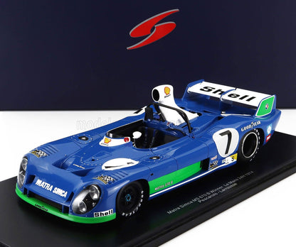 Modelo de coche de carreras Blue Matra Simca MS 670 B Le Mans 1974 con marcas Shell y Goodyear, mostrado en una base de exposición, disponible en Vroomi.