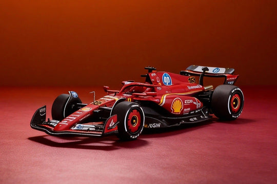 Coche rojo de Fórmula 1 Ferrari sobre fondo rojo