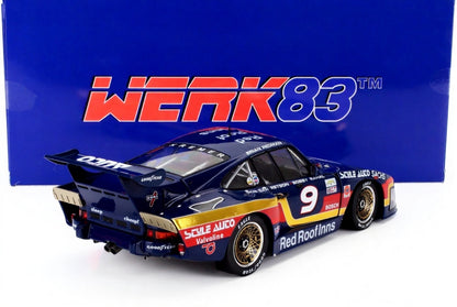 Dark blue Porsche race car model with Red Roof Inns branding and gold accents, shown with Werk83 box, available on Vroomi