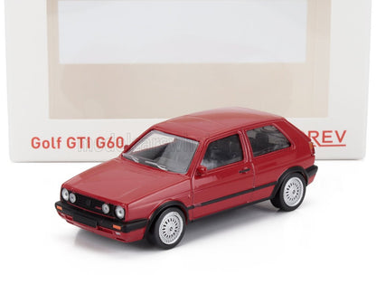 Modèle réduit Volkswagen Golf GTI Mk2 rouge avec roues détaillées, présenté dans une boîte griffée, disponible sur Vroomi.
