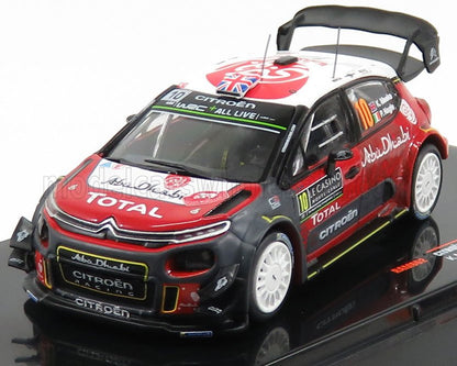 Modèle réduit de voiture de course Citroën avec livrée rouge, blanche et noire, arborant les autocollants Total et Abu Dhabi, proposé sur Vroomi.