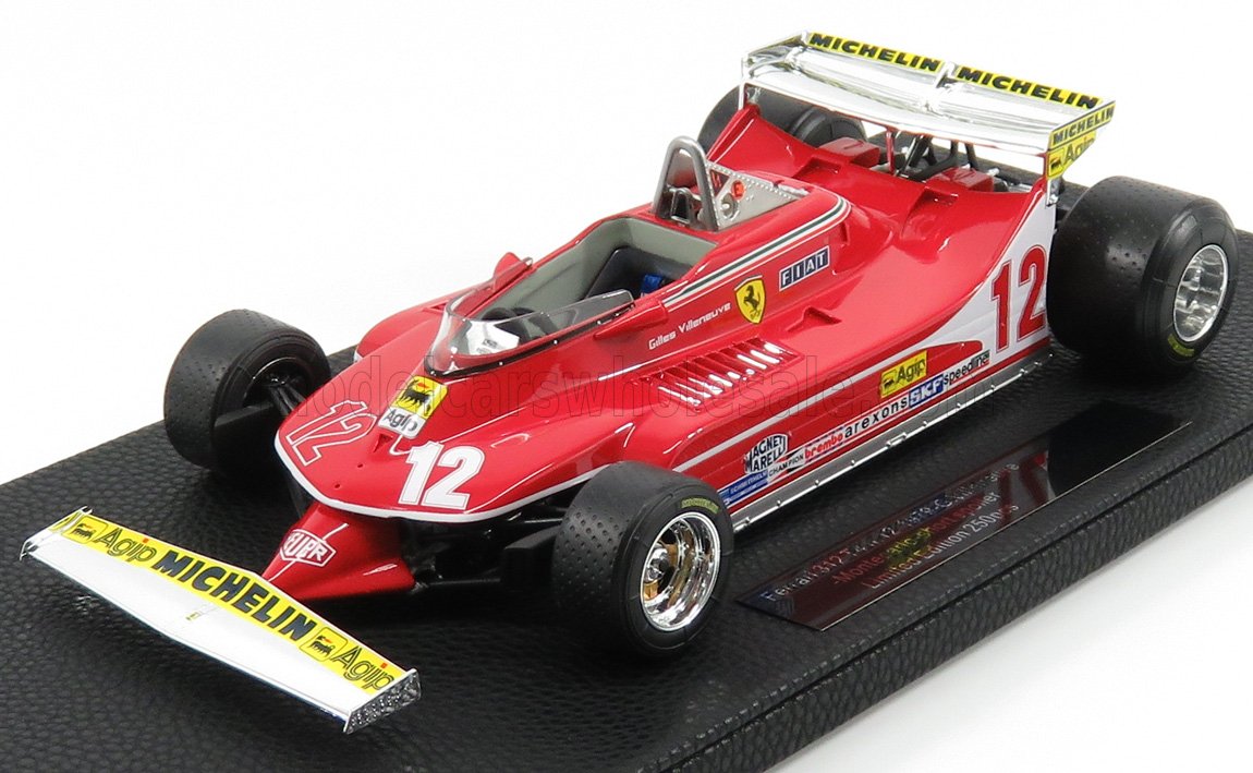 Modèle réduit de voiture de course Ferrari 312T Formule 1 rouge avec le numéro 12, logo Michelin, disponible via Vroomi.