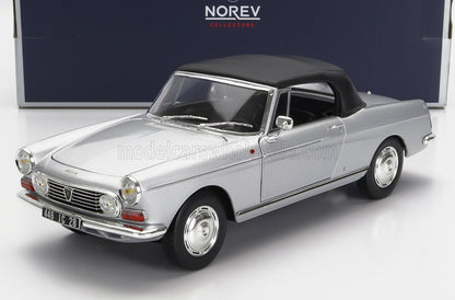 Modèle réduit Peugeot 404 cabriolet argenté avec toit noir par Norev Collectors, disponible sur Vroomi