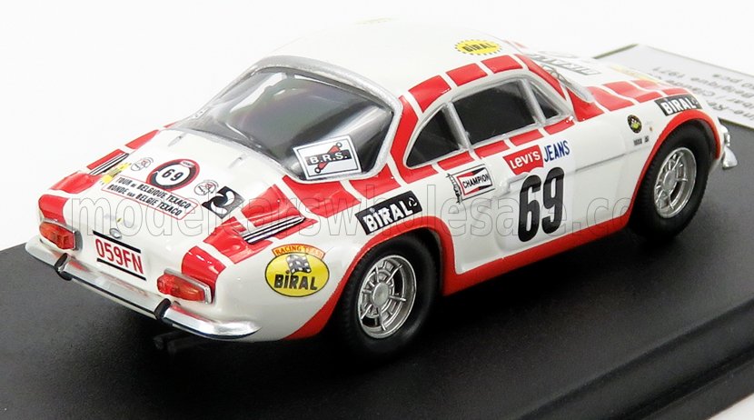 Modèle réduit de voiture de course vintage blanche et rouge avec le numéro 69 et les logos des sponsors, disponible dès maintenant sur Vroomi.