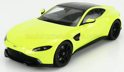 Modèle réduit Aston Martin Vantage jaune vif avec toit et roues noirs, proposé sur Vroomi.