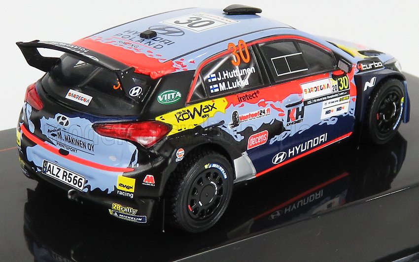 Modèle réduit de voiture Hyundai avec livrée bleue, rouge et noire, autocollants de course et numéro 30, disponible sur Vroomi.