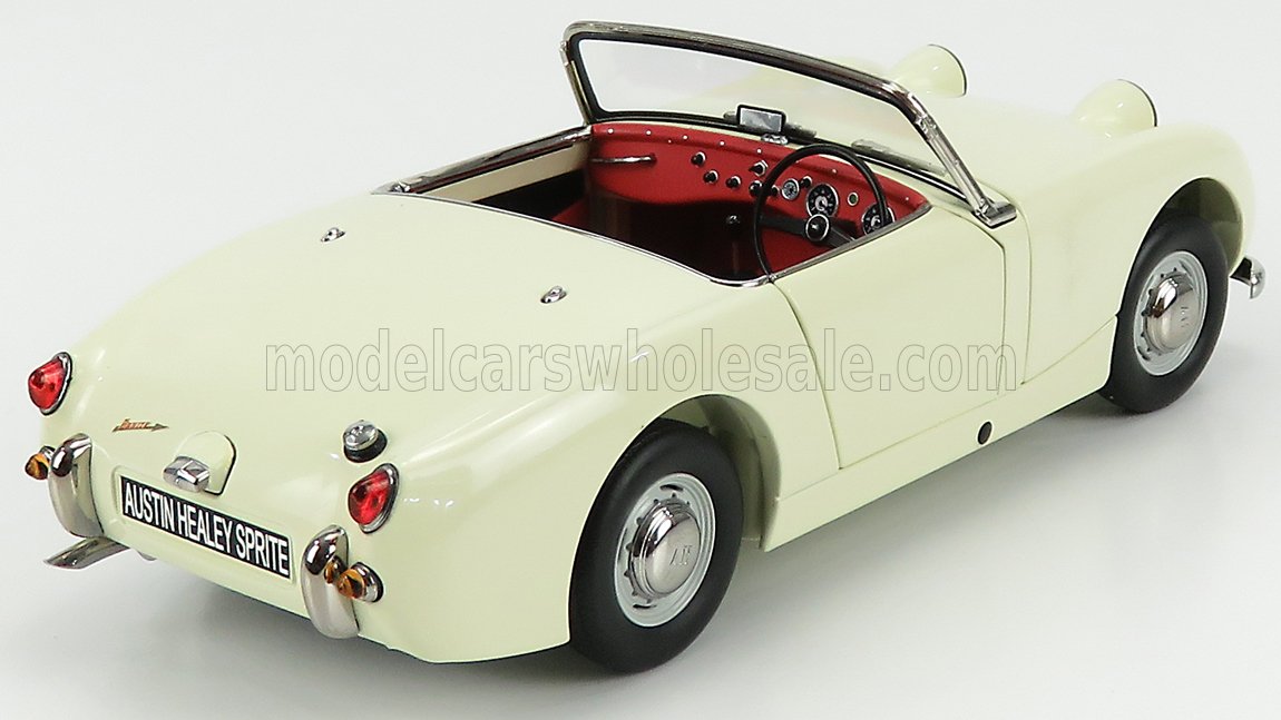 Modèle réduit de voiture décapotable classique Austin Healey Sprite de couleur crème avec intérieur rouge, disponible chez Vroomi.