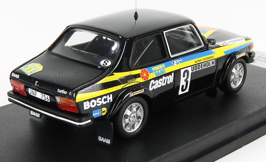 Modèle réduit de voiture de rallye Saab turbo noire avec bandes jaunes et logos des sponsors, proposé sur Vroomi.
