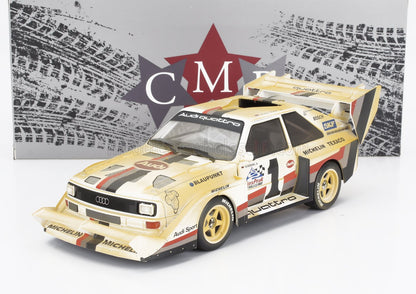 Modèle réduit de voiture de rallye Audi Quattro avec décalcomanies vintage et logo Michelin, proposé sur Vroomi.