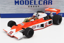 Modèle réduit à l'échelle 1:18 de la McLaren F1 de Jochen Mass avec les logos Texaco et Goodyear, disponible chez Vroomi.