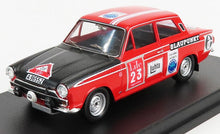 Modèle réduit classique de voiture de rallye rouge et noir avec décalcomanies de course, disponible à la commande en ligne
