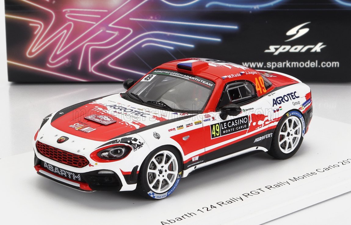 Modèle réduit Abarth 124 Rally RGT rouge et blanc avec décalcomanies de course, présenté sur la plateforme Vroomi.