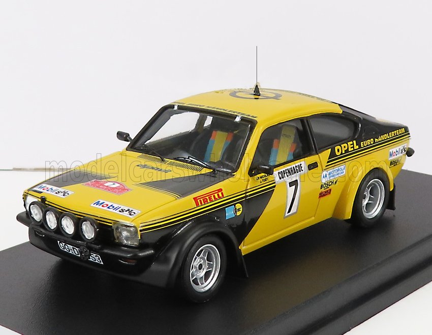 Modèle réduit de voiture de rallye Opel Euro jaune et noir avec le numéro 7, décalcomanies de course et phares, disponible sur Vroomi.