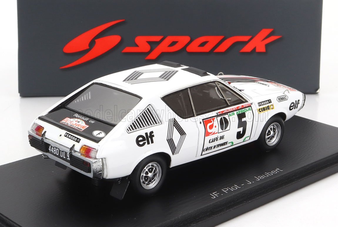 Modèle réduit de voiture de rallye Renault Elf blanche avec le numéro 5 affiché sur un socle noir, disponible sur Vroomi.