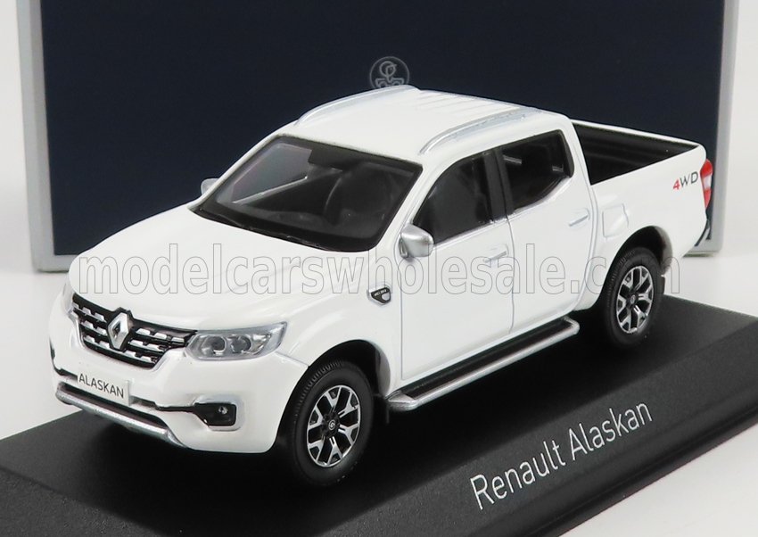 Modèle réduit de pick-up Renault Alaskan blanc avec badge 4WD, présenté sur un socle, également disponible sur Vroomi.