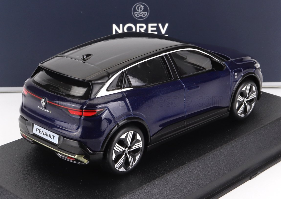 Maquette à l'échelle d'une Renault Mégane bleue avec toit noir sur socle d'exposition par Norev, proposée par Vroomi.