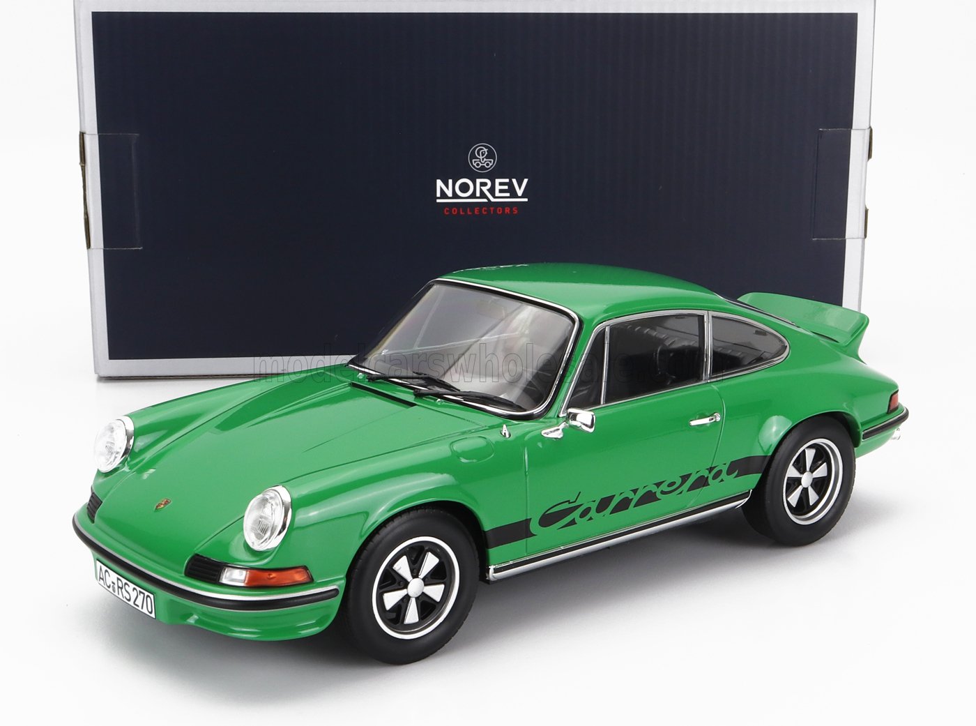 Modèle réduit Porsche Carrera vert avec décalcomanies noires, présenté devant une boîte Norev Collectors, proposé sur Vroomi.