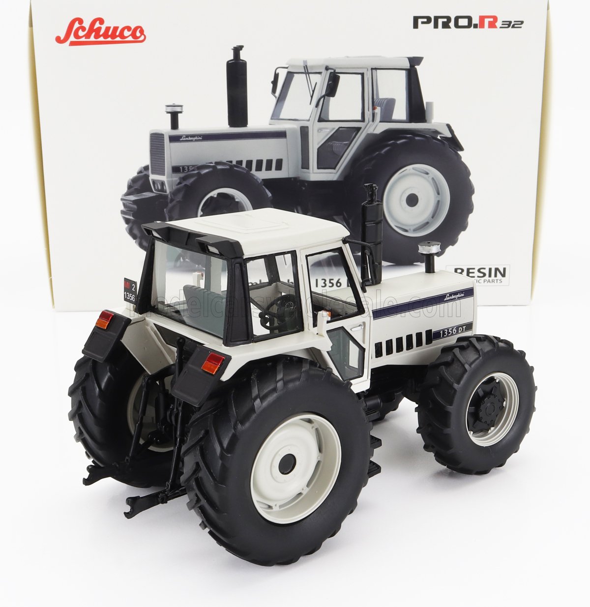 Modèle réduit de tracteur Schuco Pro R32 Lamborghini 1356 DT blanc avec pneus et cabine détaillés, disponible chez Vroomi.