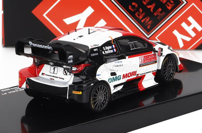 Modèle réduit Toyota Gazoo Racing WRC avec logo Panasonic en blanc, rouge et noir, disponible via Vroomi.