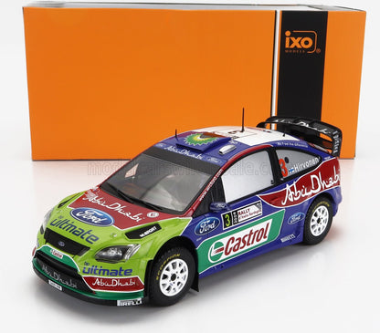 Modèle réduit de voiture de rallye Ford Focus WRC à l'échelle 1:18 avec livrée Castrol et Abu Dhabi, disponible sur Vroomi