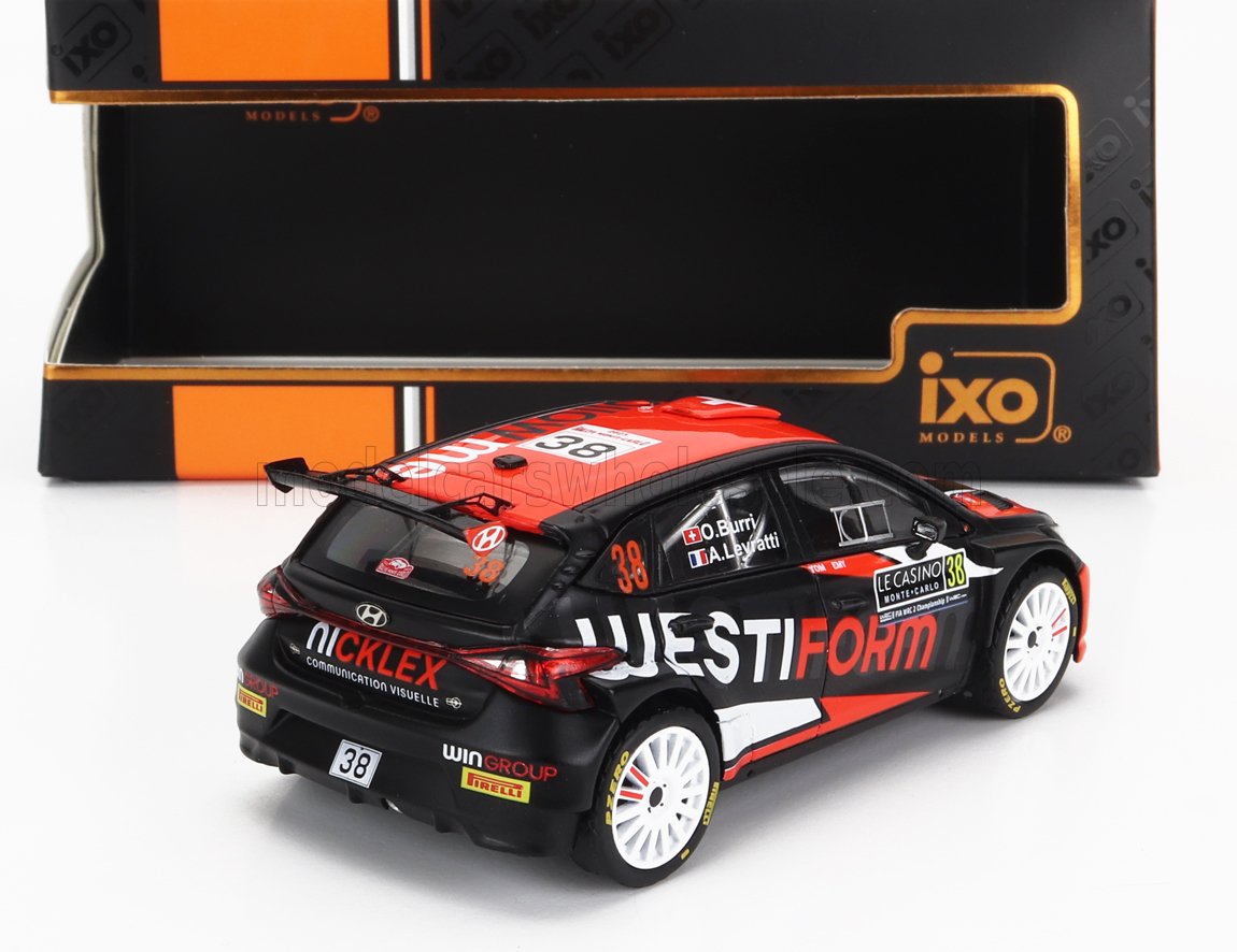 Modèle réduit de voiture de rallye à l'échelle 1/43 par IXO Models, livrée noire et rouge, disponible chez Vroomi