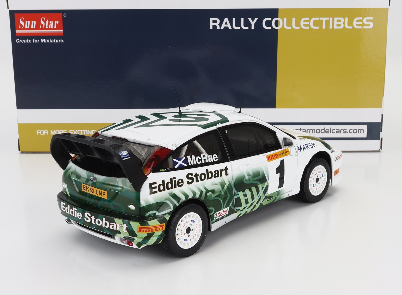 Modèle réduit de voiture de rallye Ford Focus à l'échelle 1/18 aux couleurs d'Eddie Stobart, disponible chez Vroomi.