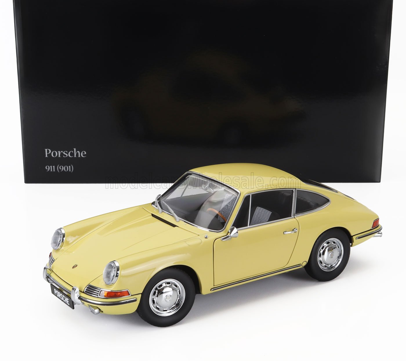 Modèle réduit de Porsche 911 (901) jaune avec boîte noire en arrière-plan, disponible chez Vroomi.
