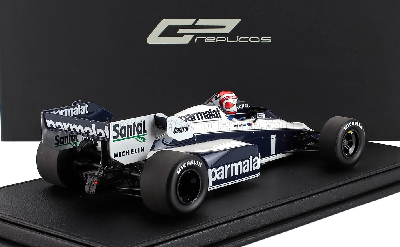BRABHAM - F1 BT53 PARMALAT N 1 VAINQUEUR DU GRAND PRIX DU CANADA (avec figurine de pilote) 1984 NELSON PIQUET - BLANC BLEU - Vroomi