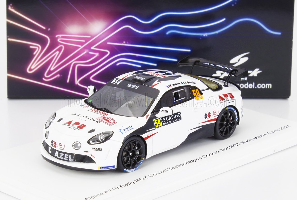 Modèle réduit Alpine Rallye blanc avec jantes noires et autocollants de course, présenté sur fond néon WRC, proposé sur Vroomi.