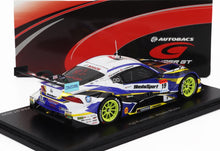 Maquette de la voiture de course WedsSport GT en bleu, blanc et jaune avec des roues vert citron, présentée avec un fond, également disponible sur Vroomi.